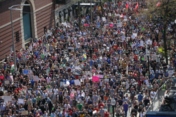 Thousands march from Roxbury to the Boston Common in a counter protest to the Free Speech rally