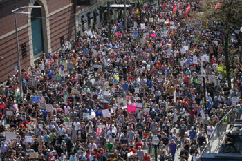 Thousands march from Roxbury to the Boston Common in a counter protest to the Free Speech rally