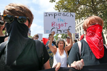 Thousands march from Roxbury to the Boston Common in a counter protest the Free Speech rally