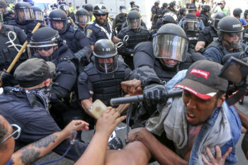 Thousands march from Roxbury to the Boston Common in a counter protest the Free Speech rally