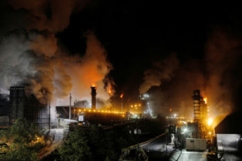 Flames and steam rise from the Suncoke Jewell cokemaking plant, which burns coal to make coke, in Oakwood, Virginia, U.S., May 19, 2018.