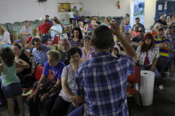 Auctioneer Michael Lambert takes bids during an auction of everyday household goods and supplies at L & G Auction in coal country in North Tazewell, West Virginia, U.S., May 19, 2018.