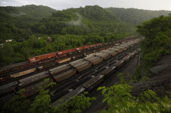 Trains cars filled with coal wait on the tracks outside Williamson, West Virginia, U.S., May 17, 2018.