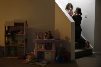 Patricia kneels down to face Camila on the stairs as she talks to her about the importance of being kind to others. Camila has been uneasy of late, and plagued by bad dreams.
Patricia has trouble sleeping, too. Her mind races, thinking about what happens if sheÕs ordered out of the country. She will not leave Camila behind.
