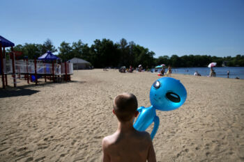 Connor walks the beach with a blow-up alien while visiting Silver Lake near his family's home in Wilmington, MA.
While Connor is making progress, it is not enough. For everyone in Connor's world, from caregivers to his family, the goal is the same. They want him to return home, but no one has any idea how long that will take.