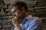 Democratic presidential candidate Beto O'Rourke, a former congressman from Texas, listens as he is being introduced during a house party at the home of Ann Garland, co-chair of the Upper Valley Democrats, in Lebanon, N.H., on May 10, 2019.