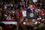 U.S. President Donald Trump looks into the audience during a rally in Manchester, New Hampshire, U.S., on Thursday, Aug. 15, 2019.