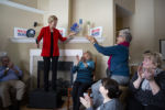 Sen. Elizabeth Warren (D-Mass.) pauses for applause after answering a question during a house party in Laconia, N.H., on Saturday, Feb. 23, 2019.