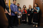 Deb Haaland (R) prays with her family in her office at the U.S. Capitol before being sworn in as one of the two first Native American women in the U.S. House of Representatives in Washington, January 3, 2019.