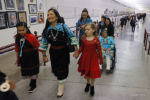 Incoming U.S. Representative Deb Haaland and her family, all wearing traditional Native American attire, make their way through the underground passageways of the U.S. Capitol before being sworn in as one of the first two Native American women in the U.S. House of Representatives in Washington, January 3, 2019.