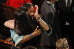 Deb Haaland becomes emotional and hugs Sharice Davids after they were sworn in as the first two first Native American women in the U.S. House of Representatives in Washington, January 3, 2019.