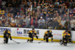 The Boston Bruins play the St. Louis Blues in Game 7 of the 2019 Stanley Cup Finals at TD Garden.The Bruins are dejected as they watch the Blues celebrate their Stanley Cup win. (left to rt) Jake DeBrusk, Matt Grzelcyk, David Krejci and Torey Krug take a knee.