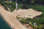 Ballston Beach in Trurolooks a bit like a battle scar, the beach blown open and sand pouring deeper inland than anywhere else along the outer Cape. The small homes that once dotted the dunes here have been moved, one was destroyed. Others are in jeopardy.