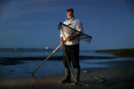 Erick Scherer made his living at night using his custom-made sharp-tined steel rake to rake up the the shallows in Barnstable Harbor at low tide for silver fish called sand lances. The sand lance is lunch for all manners of marine life and some birds, and they also make the pefect bait. About ten years ago the sand laces got hard to find, then all but disappeared. He gave up that exhausting work and switched to charter fishing. Scientists believe that sand lances are vulnerable to climate change. Scherer wonders if what he saw was actually a warning sign, a sign that the sea was in trouble.