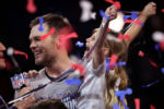 New England Patriots quarterback Tom Brady stands on podium with his daughter Vivian as confetti falls around them after the game. New England Patriots vs. LA Rams in Super Bowl LIII at Mercedes-Benz Stadium in Atlanta on Feb. 03, 2019.
