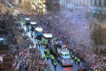 Duck boats and trucks full of Patriots players and staff roll down Boylston Street in Boston during the New England Patriots Super Bowl LIII victory parade on Feb. 5, 2019.