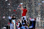 New England Patriots wide receiver and Super Bowl LIII MVP Julian Edelman taps his heart and points to the fans to show his love during the New England Patriots Super Bowl LIII victory parade in Boston, MA on Feb. 05, 2019.