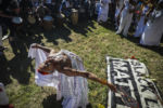 BOSTON - 7/4/2020: Isaura Oliveira dances while holding a sacred space for the Black women who have been slain by law enforcement. More than 1,000 people gathered Saturday afternoon to celebrate the lives of Black women and demand an end to police violence, with a march from Nubian Square in Roxbury scheduled to end with a rally at Boston Common.
