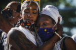BOSTON - 7/4/2020: Danielle Ruffen, left, embraces her friend as they hold sacred space for the Black women who have been slain by law enforcement. More than 1,000 people gather Saturday afternoon to celebrate the lives of Black women and demand an end to police violence, with a march from Nubian Square in Roxbury scheduled to end with a rally at Boston Common.