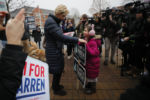 Senator Elizabeth Warren campaigned offering the promise that every girl and woman could achieve anything they wanted, even being nominated for the presidency. Warren withdrew from the race March 5, 2020.
Democratic 2020 U.S. presidential candidate and U.S. Senator Elizabeth Warren (D-MA) greets a young supporter at a polling site for New Hampshire’s first-in-the-nation primary in Portsmouth, New Hampshire, February 11, 2020.