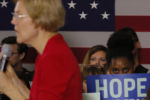 Audience members listen as Democratic 2020 U.S. presidential candidate and U.S. Senator Elizabeth Warren (D-MA) speaks at a Get Out the Caucus rally in Indianola, Iowa, February 2, 2020.