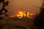 2020 was another record setting year for wildfires in Southern California. There were over 9,000 fires and over 4 million acres of forest burned.
A house burns during the Bobcat Fire in Juniper Hills, CA.