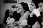 Raeven's sister, Vivyian, holds one of 16 roses Raeven gave out to friends and family during a ceremony at her Sweet 16 party on February 29, 2020.