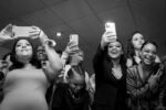 Family members record the court as they dance during Raeven's Sweet 16 party on February 29, 2020.