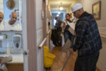 This story follows two brothers, Benjamin and Renaldo Torres, as they participate in a year-long recovery program at The Open Door Mission homeless shelter in Rochester, N.Y. The open door mission is a homeless shelter with multiple branches, one of which is a year-long program for those in Recovery. According to the CDC, “From 1999 to 2018, over 750,000 people died from a drug overdose.” In 2018 there were over 70,000 overdose-related deaths. Addiction is a rising issue, and we see it, but what does recovery look like, and how may it reframe the way we think about this epidemic. Benjamin, 55, and Renaldo,52, are current residents in this program. The program is based around genesis, a five-phase recovery plan with a heavy emphasis on faith. The two brothers are in different stages in their respective recovery, and both are at a later point in their life. Recovery and addiction can be a lifelong battle and affects all demographics.
------------------------------------------------
Renaldo,52, and Benjamin,55, sit in the Open Door Missions Library in Rochester, N.Y. The Torres brother grew up in Puerto Rico and moved to America in their twenties. “(I’ve) almost been using heroin for 22 years,” say’s Benjamin. “(I) got tired and came here and it is the best place. I feel like Jesus is here. Everyone here is really respectable. They always listen. I’m 55 has been and have been here for 55-days. My brother Renaldo is 52, and in a month, he’s ready to graduate.” During the week, all residents are assigned chores in the morning. The brothers often work together to complete their tasks. Renaldo shared the start of him using as a young teenager, “ being a follower being around friends that used and I wanted to be like them, and I got it, and I fit in I guess a lot of things I went through as a child, depression, and anxiety. I use drugs and alcohol to cope”.
