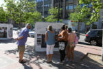 Visitors look at the exhibition. Photo By Faith Ninivaggi. Visitors look at the exhibition. Photo By Faith Ninivaggi.